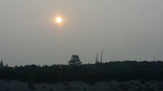 thesmokeandhazeintheairwassothickthismorningicouldlookdirectlyatthesunweedcalifornia.jpg